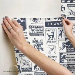Jurassic World Dominion Signs Peel And Stick Wallpaper Tan/Blue - RoomMates -Kids’ Furniture Store GUEST 9bebc459 3c57 4555 b27b e4e156778ae1