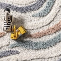 NuLOOM Adette Abstract Swirl Kids Tassel Area Rug -Kids’ Furniture Store GUEST 9ce7c543 f639 4a30 9e06 19f33d9fef34