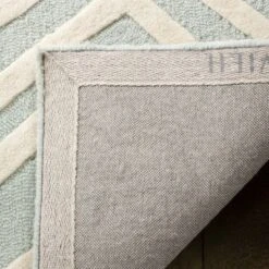 Safavieh Kids SFK910 Hand Tufted Area Rug - Safavieh -Kids’ Furniture Store GUEST f320feed 6e60 4952 96ce bfe3189f733d